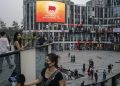China’s Growth Slows as Pandemic Fears Persist