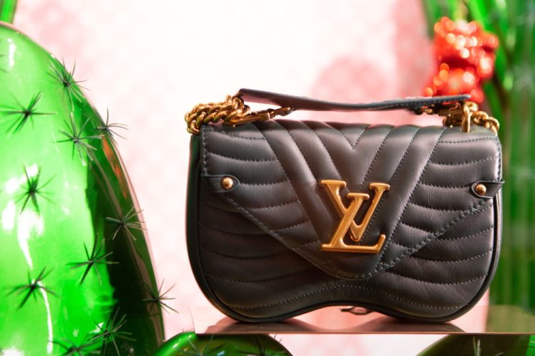 A Comparative Guide to Wearing,Louis Vuitton,Gucci and Prada Bags